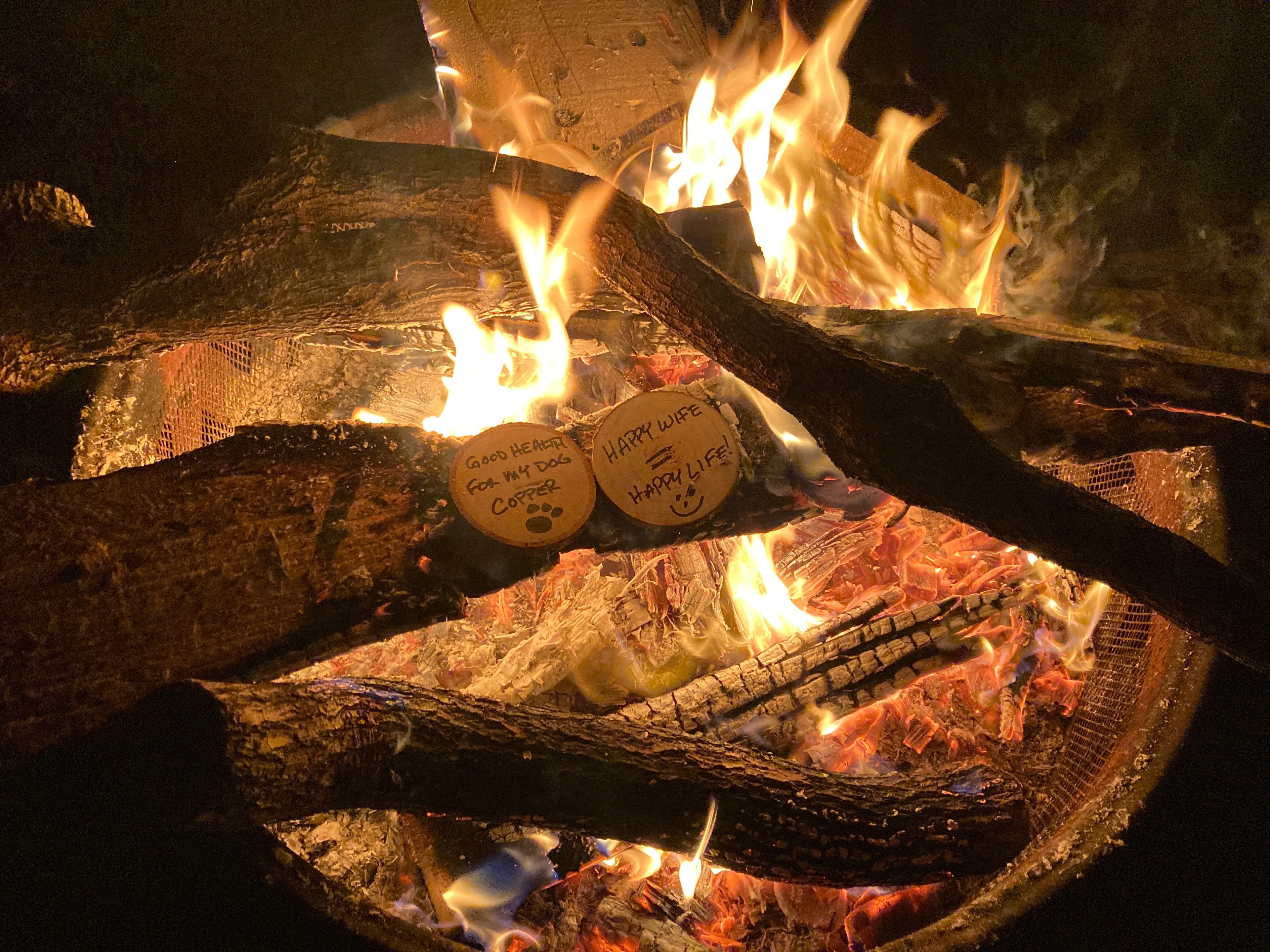 <img src="wish-for-dog-wife-around-campfire_jpg”  alt="wishing my dog and wife have good health around our campfire - wish wood - for making memories and experiences"/>