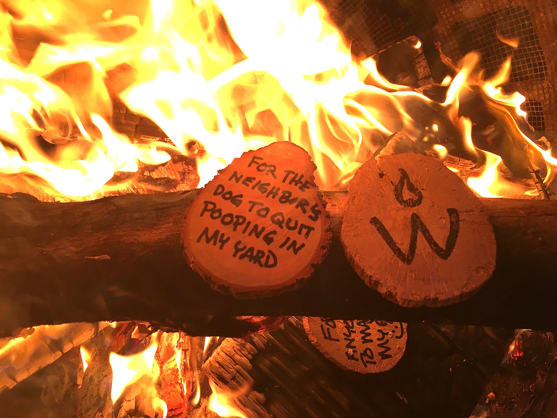 <img src="wishes-camping-outside-fire-burning_jpg”  alt="making wishes outside around a campfire - wish wood - for making memories and experiences"/>