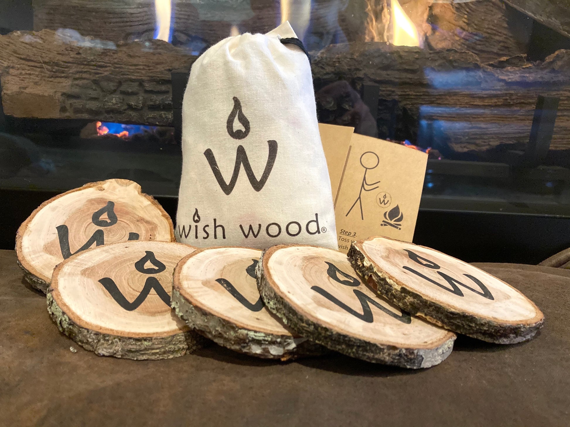 <img src="cozy-fireplace-warmth-chips-family_jpg”  alt="family around cozy fireplace making wishes - wish wood - for making memories and experiences"/>