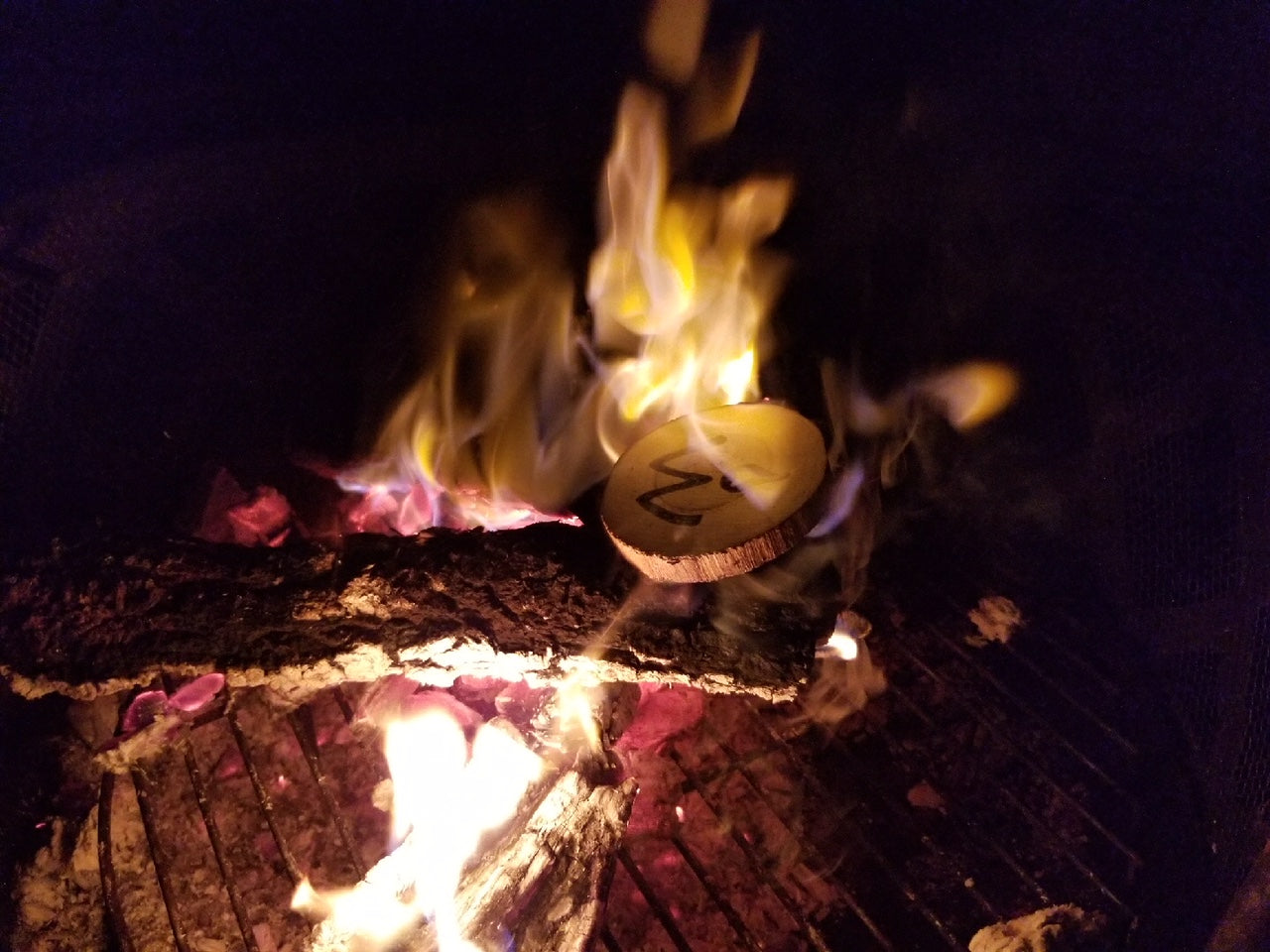 <img src="fire-outside-friends-family-experience_jpg”  alt="family and friends around outside campfire experiencing wishes - wish wood - for making memories and experiences"/>